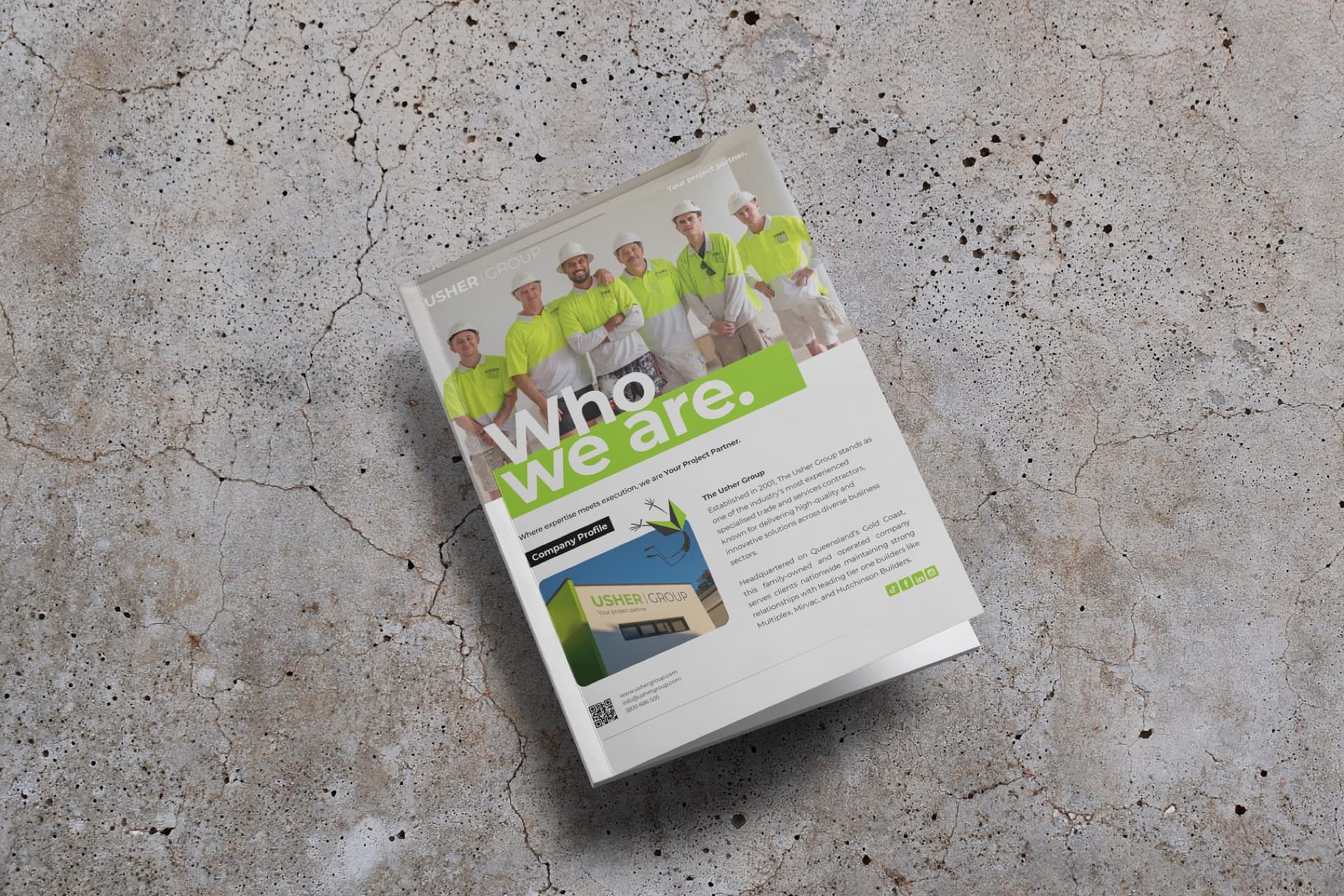 Usher Group "Who we are" booklet by Lucky Boy Agency, showing brand identity applied to print collateral.