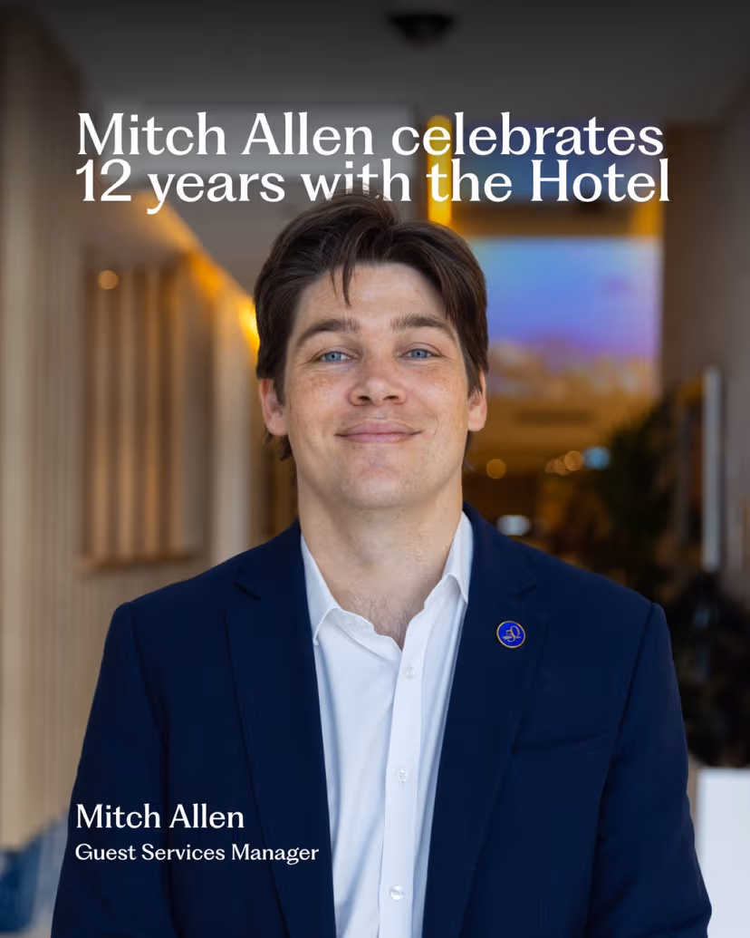 A social post of guest services manager Mitch Allen in a navy blazer, celebrating 12 years with the hotel.