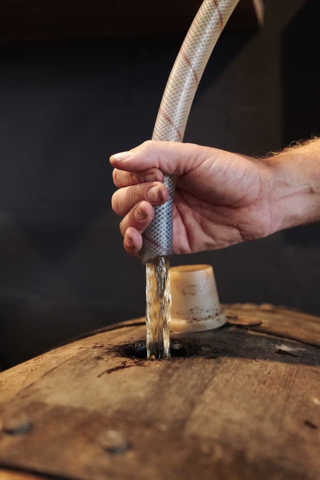 Spirit drawn from a barrel at the Capricorn Distilling Co distillery