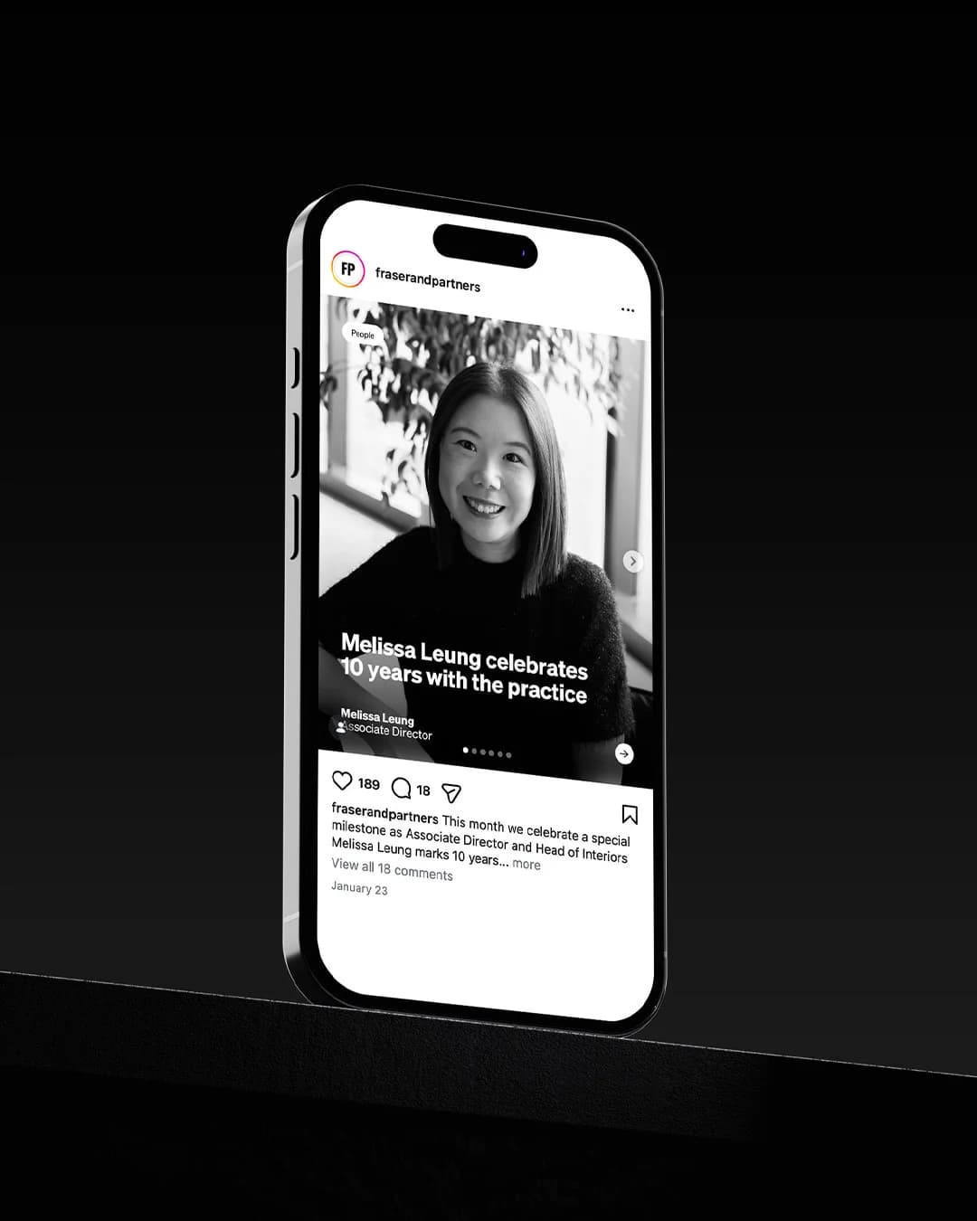 Phone mockup on a dark backdrop showing a branded Instagram post with comments and engagement metrics.