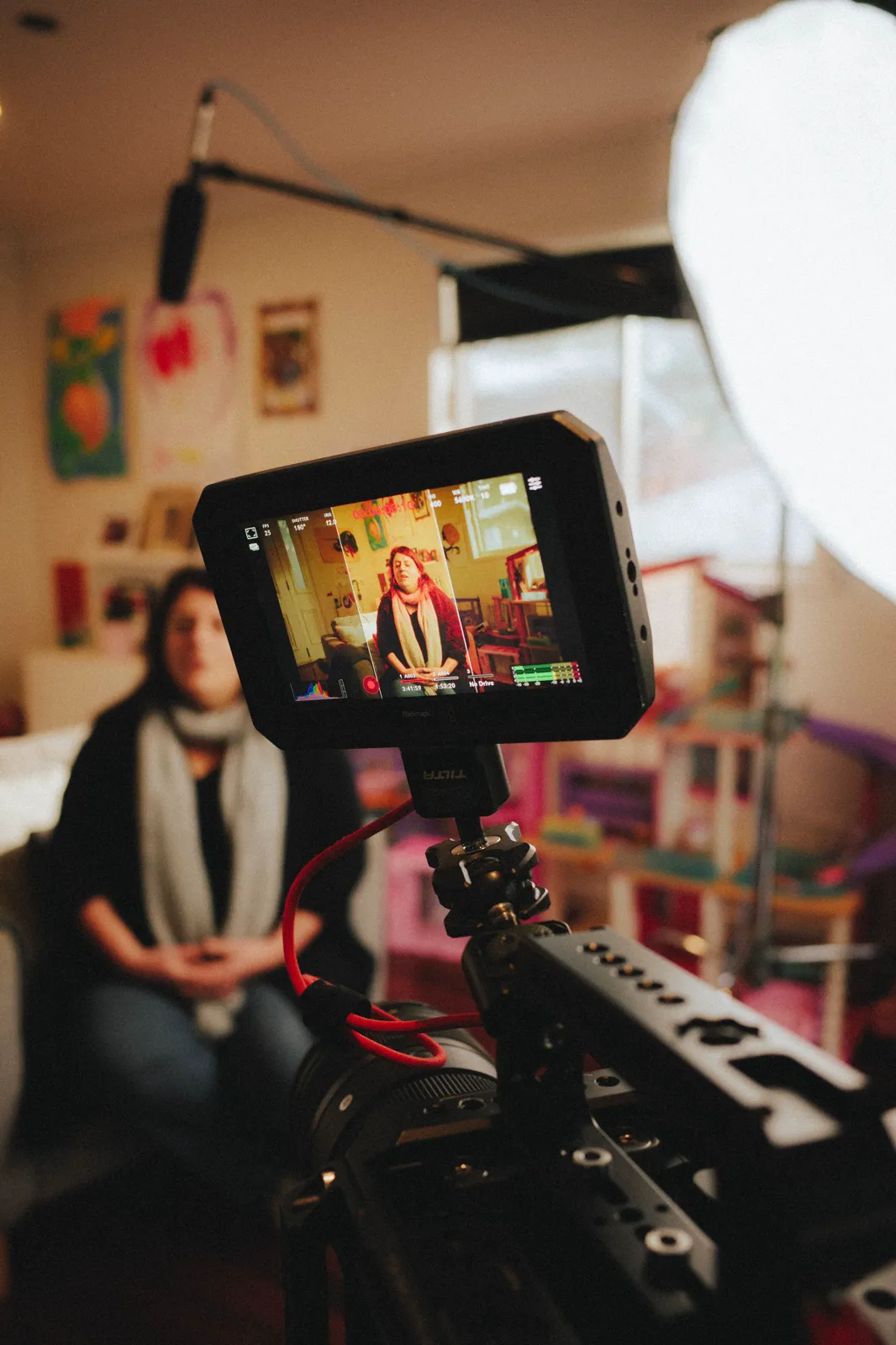 Angelina on the camera monitor during her documentary interview