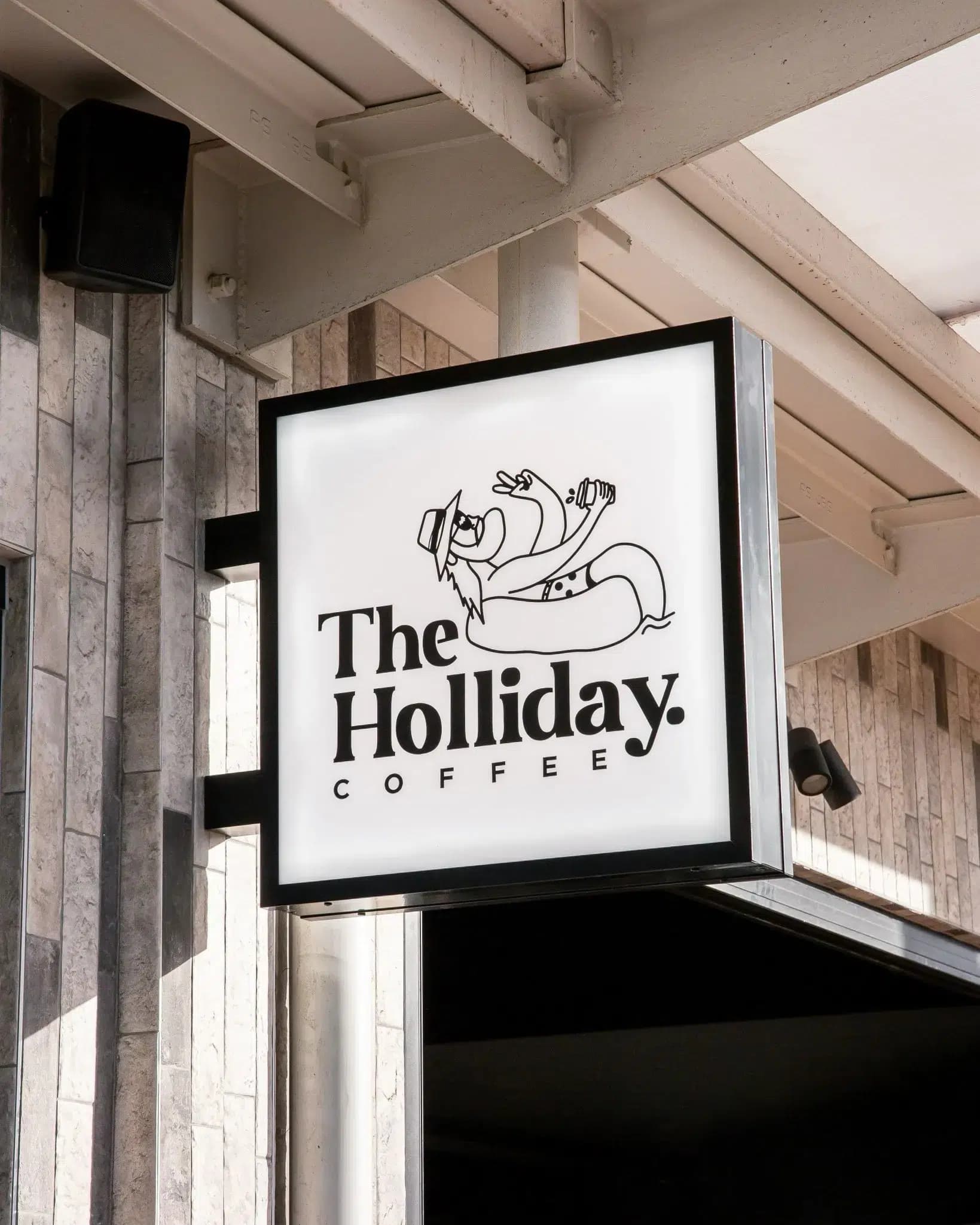 Brand identity work for Holliday by Lucky Boy Agency, applied across print and stationery.