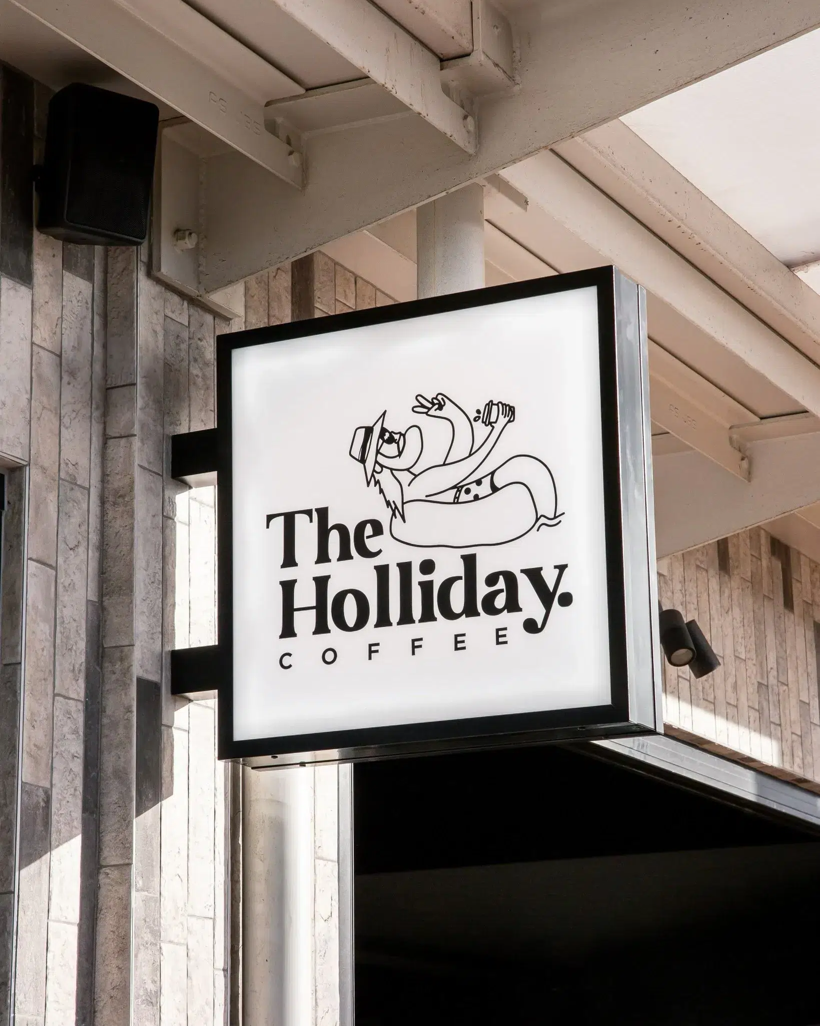 Brand identity work for Holliday by Lucky Boy Agency, applied across print and stationery.