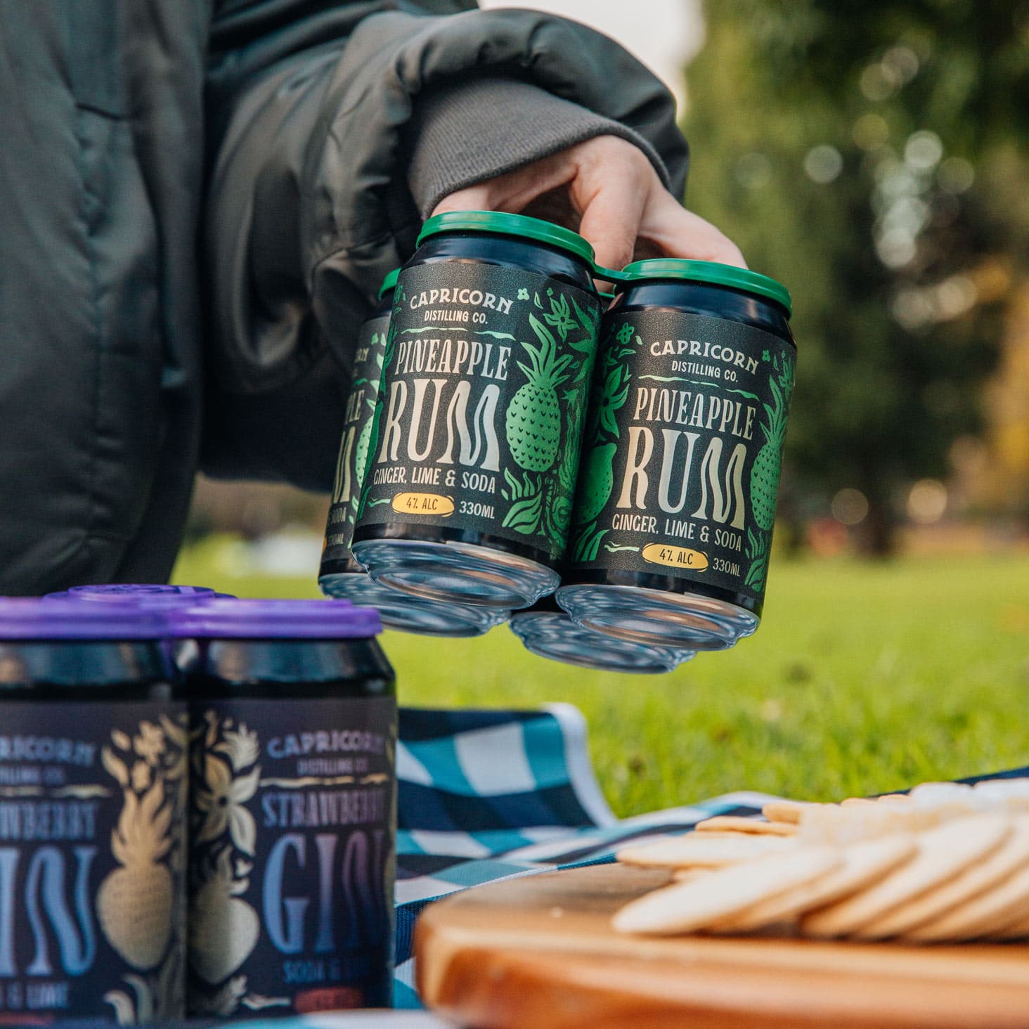 Capricorn Distilling Co Pineapple Rum and Strawberry Gin cans styled for a brand product shoot by Lucky Boy Agency.