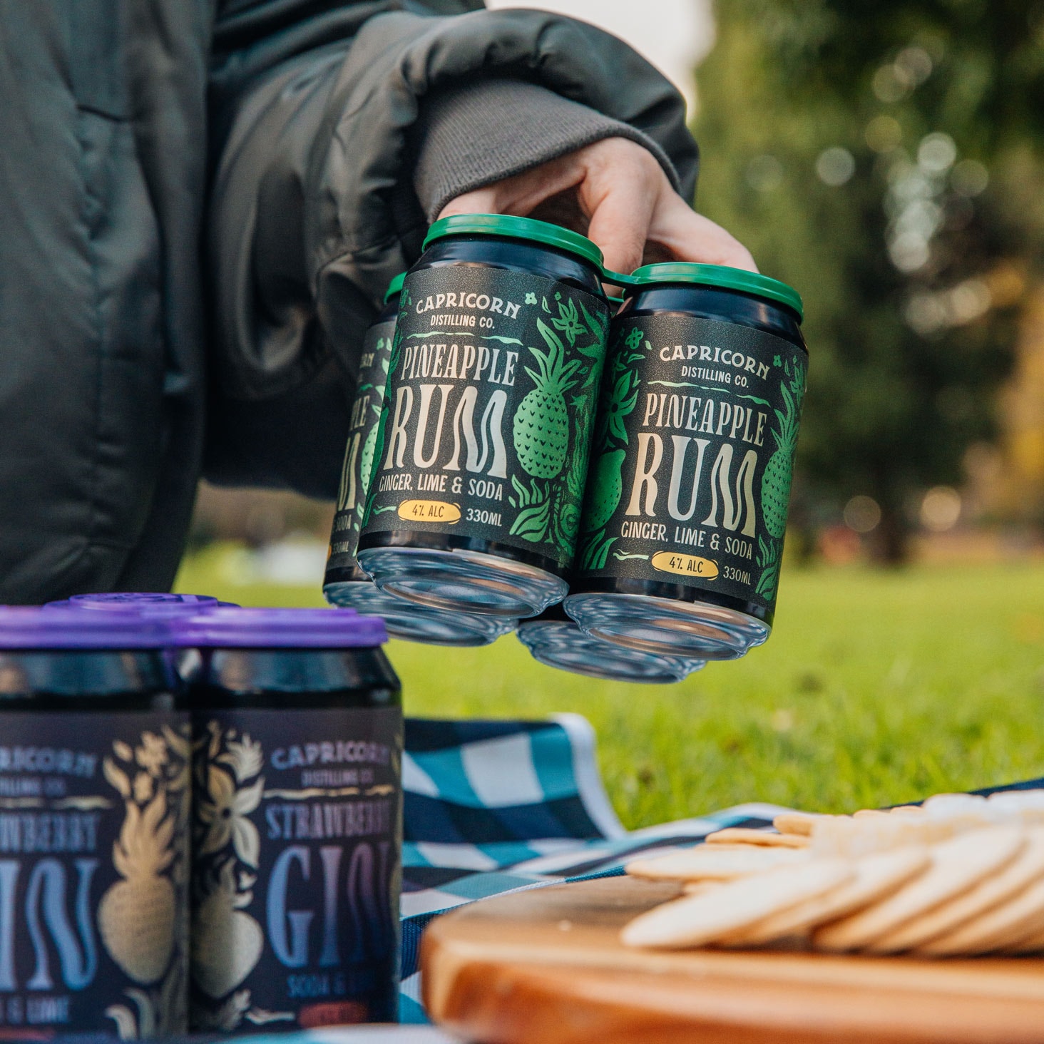 Capricorn Distilling Co Pineapple Rum and Strawberry Gin cans styled for a brand product shoot by Lucky Boy Agency.