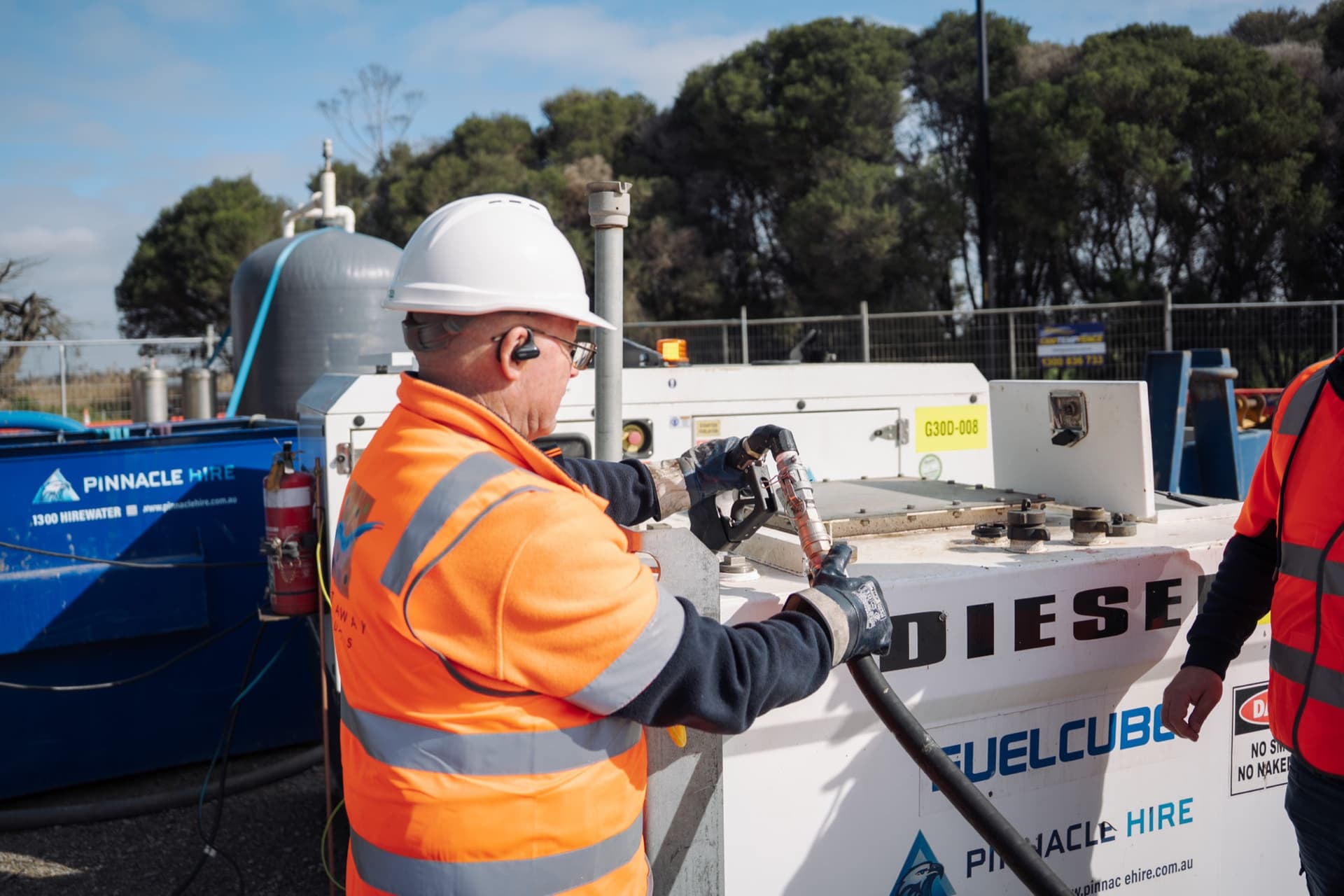 An operator filling a site diesel cube from the Padthaway truck.